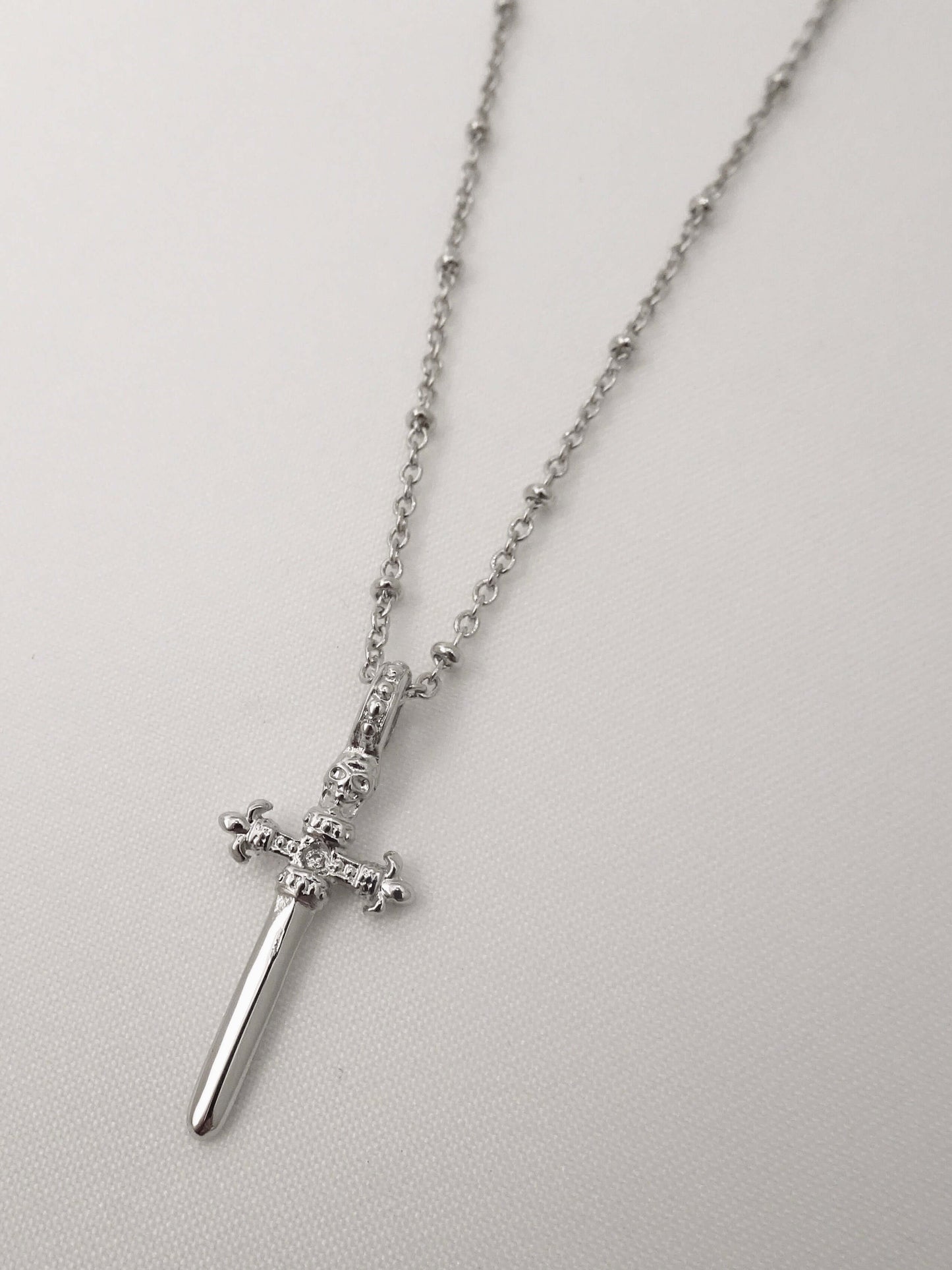 SPARROW small dagger pendant necklace, unisex men's and women's fashion jewelry, edgy minimalist necklace, punk alternative style, men's jewelry, men's necklaces, gold jewelry, trendy jewelry, statement jewelry, rebellious accessory